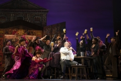 (center, seated) Adam Grupper as Alfred P. Doolittle and Company in The Lincoln Center Theater Production of Lerner & Loewe’s MY FAIR LADY Photo: Joan Marcus